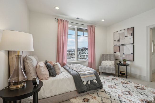 Carpeted bedroom featuring baseboards, visible vents, and recessed lighting | Image 32