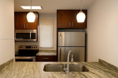 f-9909 Twin Lakes Dr, Coral Springs, FL, 33071-5331 | Card Image