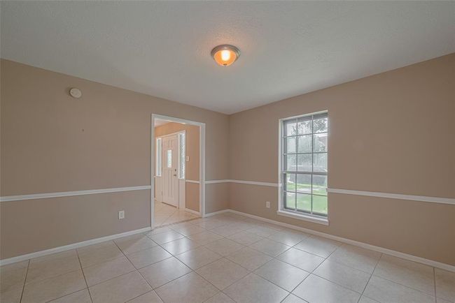 5711 Arenas Timbers Dr, House other with 4 bedrooms, 3 bathrooms and 2 parking in Humble TX | Image 5