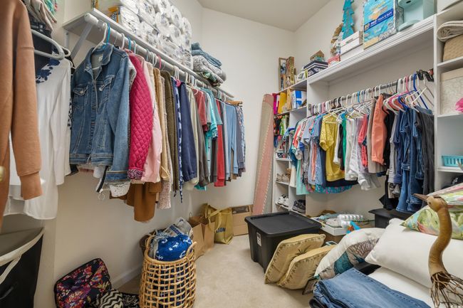 Walk in closet with carpet | Image 23