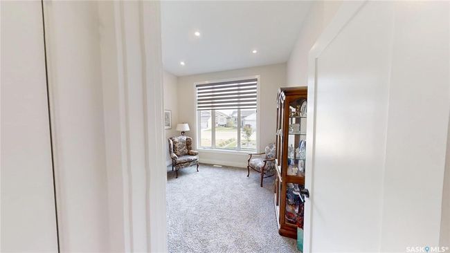Sitting room with carpet floors and recessed lighting | Image 13
