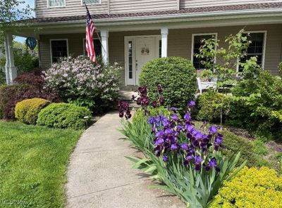 Doorway to property with covered porch | Image 2