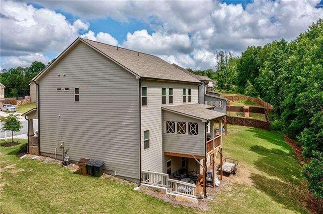 7059 Lancaster Xing, House other with 4 bedrooms, 3 bathrooms and 3 parking in Flowery Branch GA | Image 39