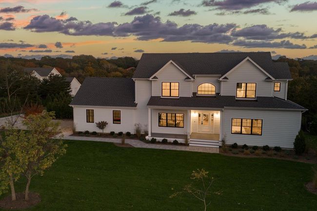View of front facade featuring a lawn | Image 20