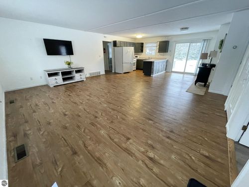 10511 Lake Of The Woods Rd, Mancelona, MI, 49659-8882 | Card Image