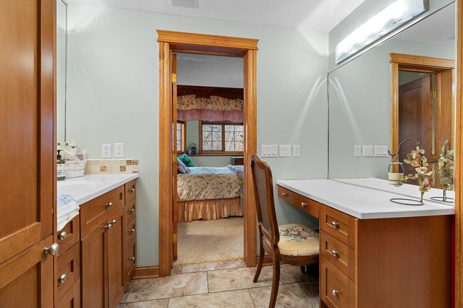 Lower-level second bedroom full bath and walk-in closet. | Image 59