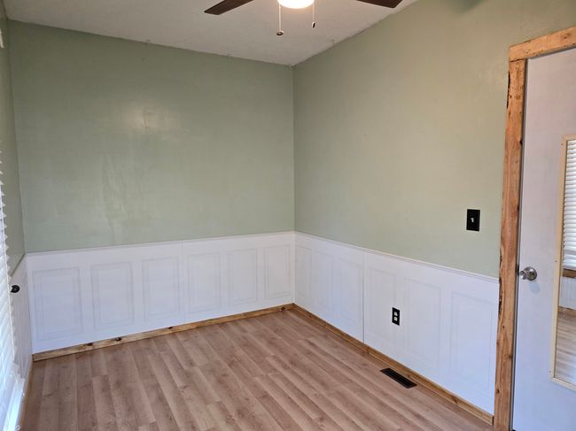 Empty room featuring ceiling fan and light hardwood / wood-style flooring | Image 14