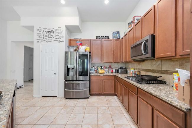14008 Harmony Ridge Trl, House other with 4 bedrooms, 3 bathrooms and 2 parking in Pearland TX | Image 10