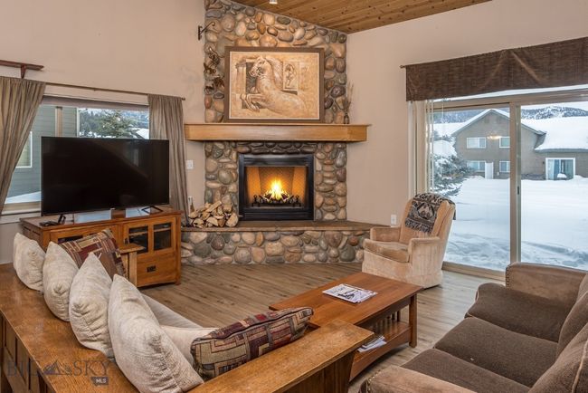 Gather around and warm your toes and share your stories of the day's mountain adventures | Image 4