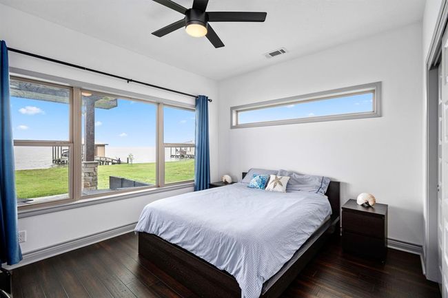 Secondary Bedroom facing the lake on the 1st Floor. | Image 12