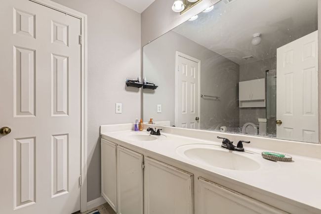 Bathroom featuring double vanity | Image 21