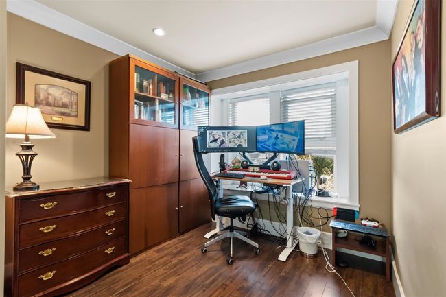 Office featuring dark wood-style floors and recessed lighting | Image 23