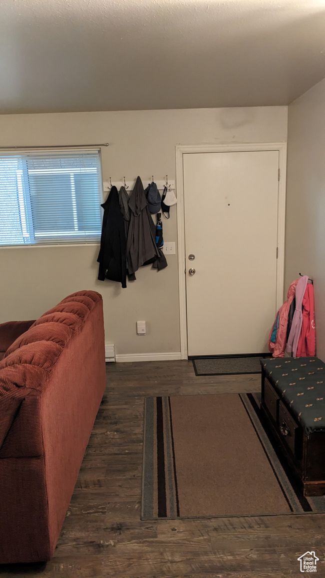 Entrance foyer with wood finished floors and baseboards | Image 6