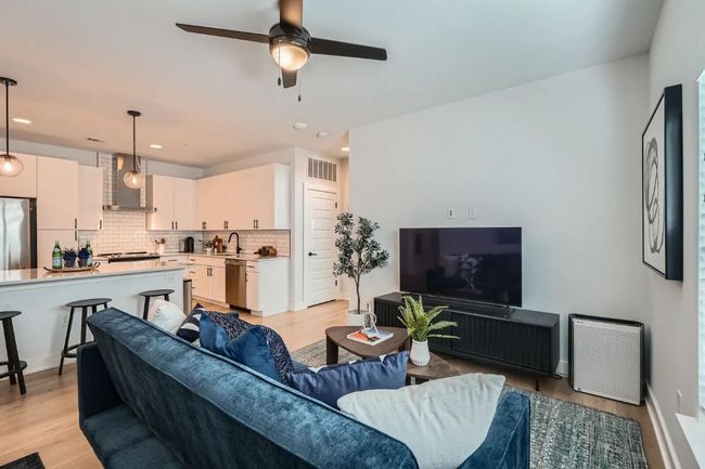 Living area with ceiling fan, recessed lighting, and light wood-type flooring | Image 8