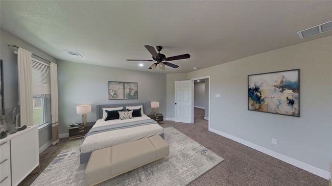 Virtually Staged. Bedroom featuring carpet floors, baseboards, visible vents, and ceiling fan | Image 8