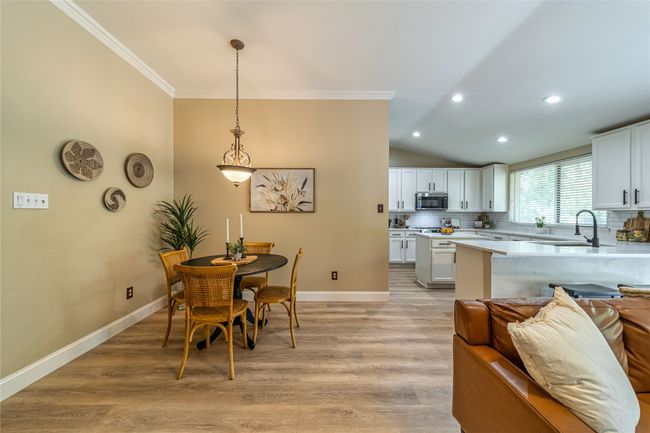 Dining opens into living and kitchen | Image 5