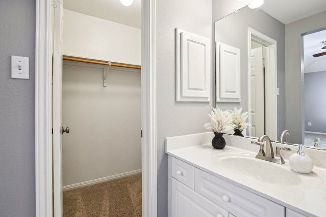 Immaculately maintained bathrooms with modern updates throughout. | Image 26
