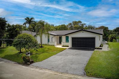 1984 Nw 86th Ter, House other with 3 bedrooms, 2 bathrooms and null parking in Coral Springs FL | Image 1