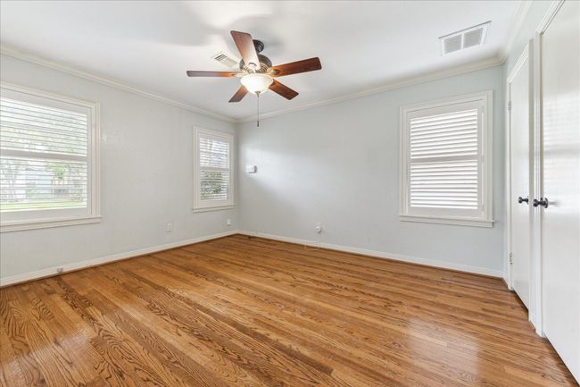 Primary bedroom with abundance of natural light, beautiful hardwood floors and great closet space. | Image 6