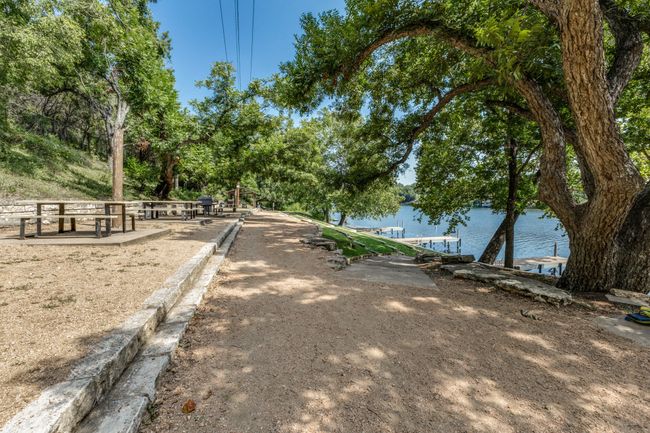 View of community featuring a water view | Image 35