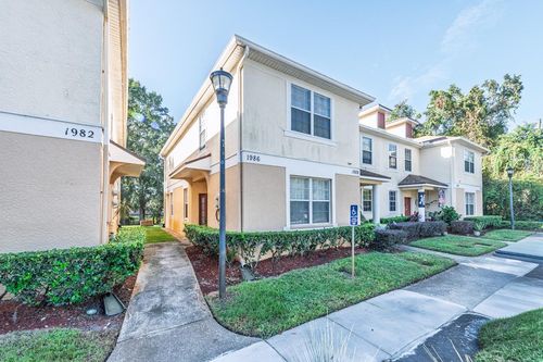 1986 Fiesta Ridge Ct, TAMPA, FL, 33604-7700 | Card Image