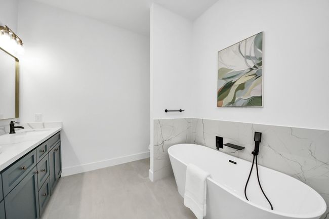 The freestanding tub is perfect for relaxing! | Image 17