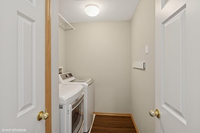 Upper level laundry with storage | Image 32