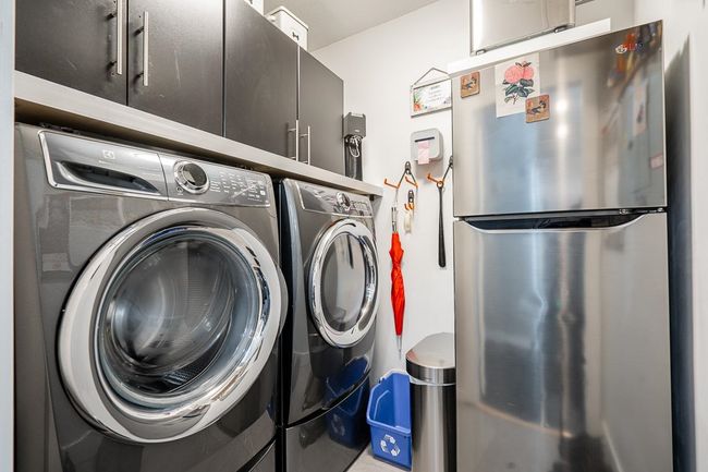 Laundry room with independent washer and dryer | Image 27