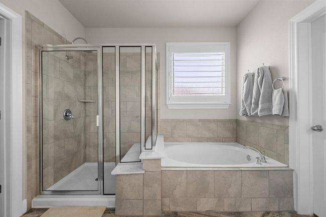 Full bath with a garden tub and a shower stall | Image 22