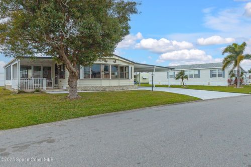 939 Thrush Circle, Barefoot Bay, FL, 32976 | Card Image