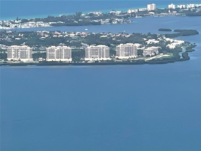Aerial view of the Grand Bay community facing the Gulf. Our unit is in the building fourth from the left | Image 48