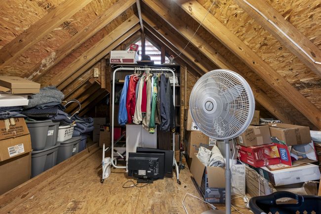 Floored and lighted attic storage off the 3rd Bedroom | Image 20