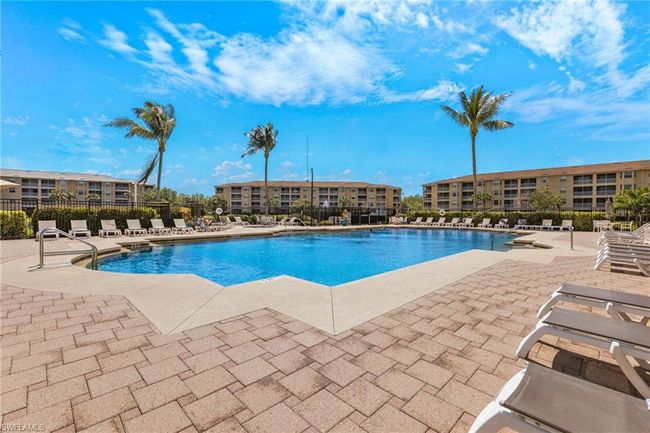 View of pool with a patio | Image 22