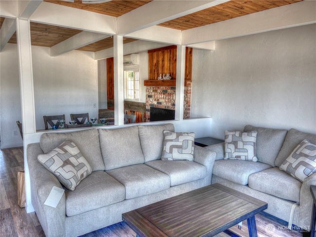 Dining Atea with Cozy Fireplace | Image 6