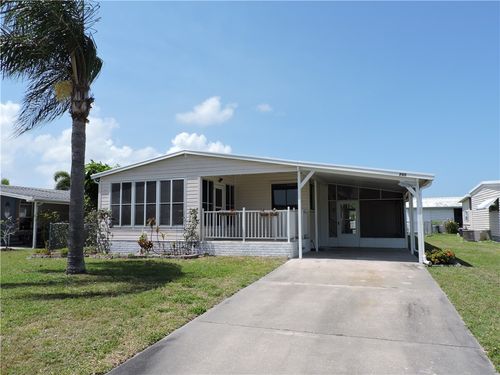 703 Draco Dr, Barefoot Bay, FL, 32976-6601 | Card Image