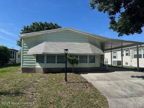 578 Dolphin Cir, Barefoot Bay, FL, 32976-2596 | Card Image