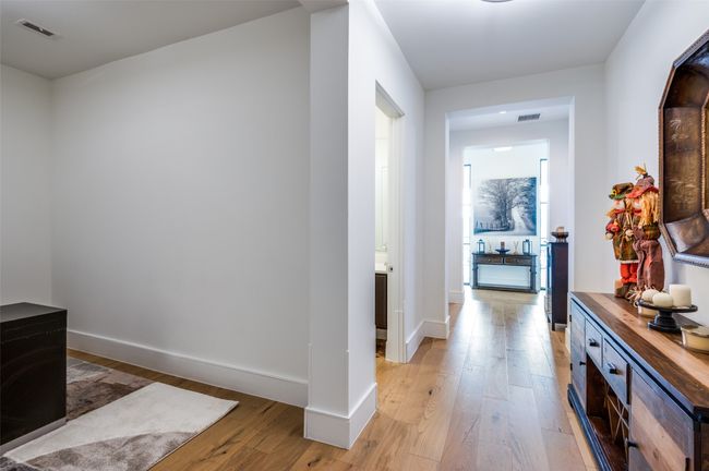 View from front door with office to the left of entry, hallway to guest bath to the left. | Image 20