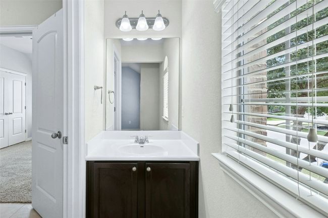 Bathroom featuring vanity | Image 23