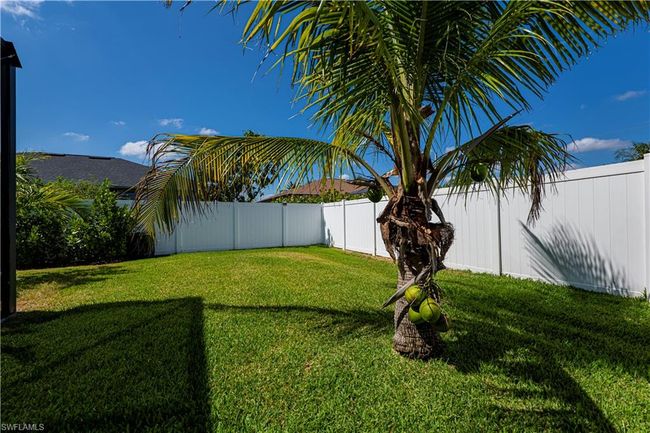View of yard featuring a fenced backyard | Image 33