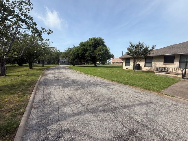 Rear view of the home and property. | Image 12
