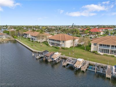 Birds eye view of property featuring a water view | Image 1