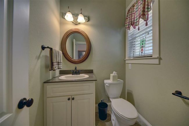 Powder room with pool access. | Image 32