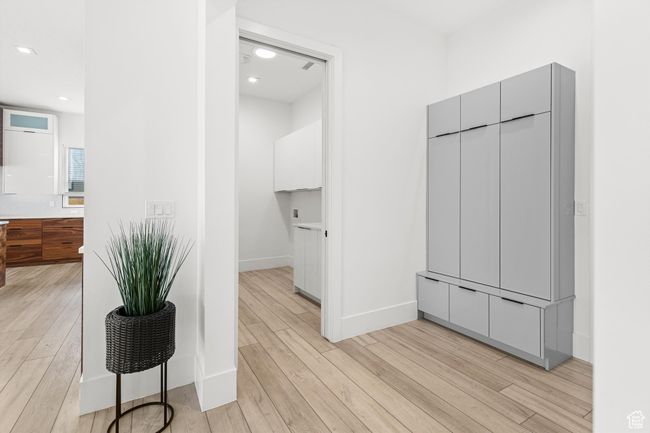 Mudroom with recessed lighting, light wood-type flooring, and baseboards | Image 25