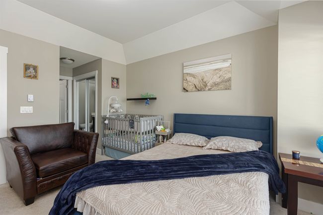 Bedroom with carpet flooring | Image 25