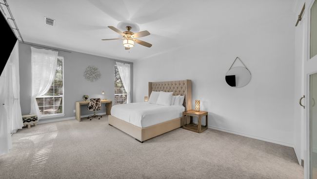 Bedroom with carpet and ceiling fan | Image 20
