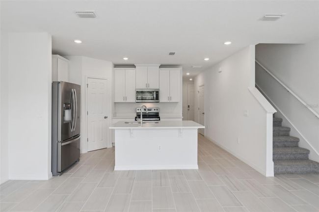 16403 Bird Of Paradise Ave, Townhouse with 3 bedrooms, 3 bathrooms and null parking in CLERMONT FL | Image 9