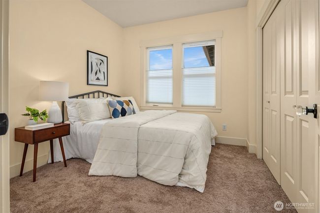 The second bedroom presents a versatile space with endless possibilities - guest room, home office, or creative area. | Image 17