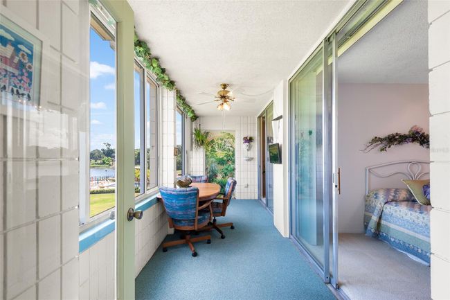 BONUS ROOM OVERLOOKS THE LAKE! BOTH BEDROOMS OPEN ONTO THE BONUS ROOM. | Image 20