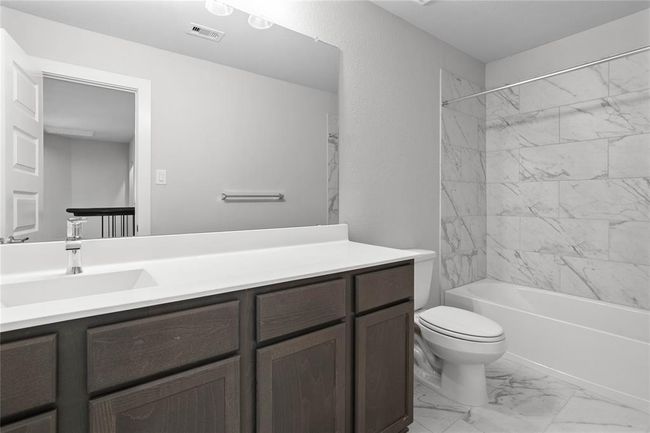 This photo is for illustrative purposes only and is not to be considered an exact replica of the finished home. Rendering does not match the finished product in terms of features, colors, landscaping, etc. Pricing, specifications, square footage and materials are subject to change at any time and without notice. | Image 16