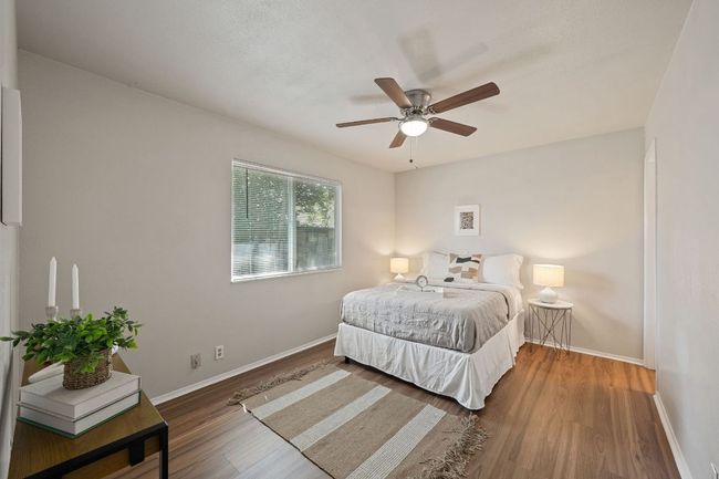 In-law floorplan with the primary suite privately set back from the front. | Image 16